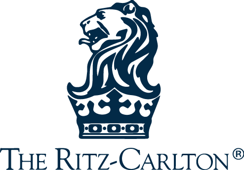 Logo of The Ritz-Carlton featuring a lion and crown, symbolizing luxury and elegance.