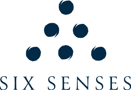 Logo of Six Senses, a luxury hotel and wellness brand, featuring a triangle with six dots.