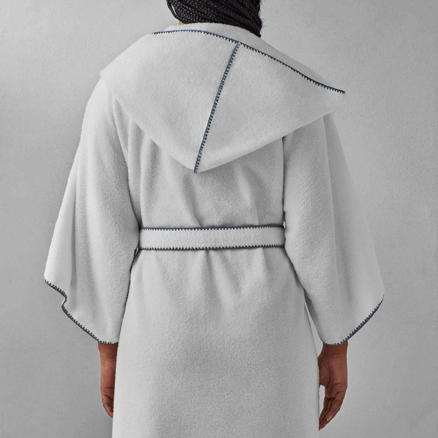 Back view of Bordado Hooded Gray Trim robe showcasing chill-resistant hood, ¾ sleeves, and self-tie belt.