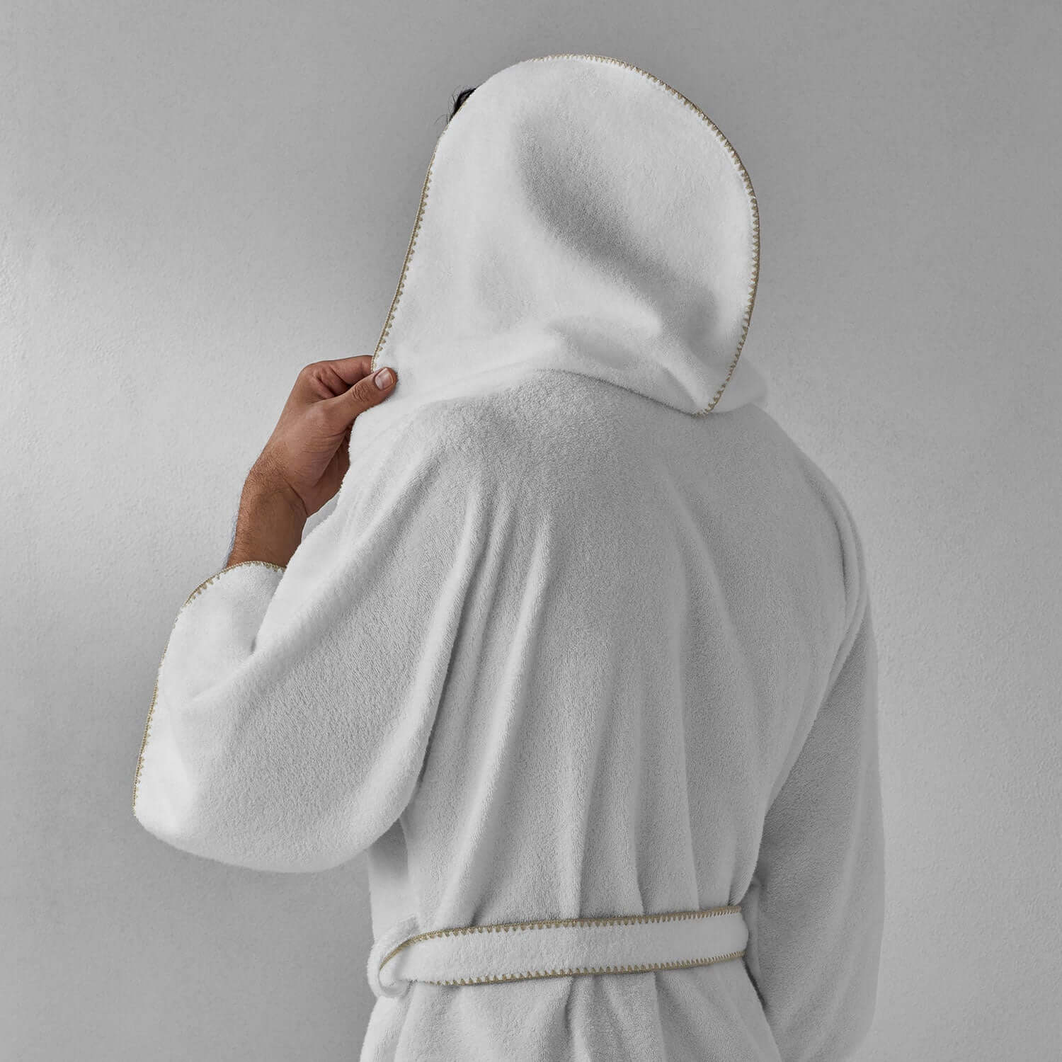 Back view of Bordado Hooded Sand Trim robe featuring a plush feel and stylish self-tie belt, perfect for relaxation.