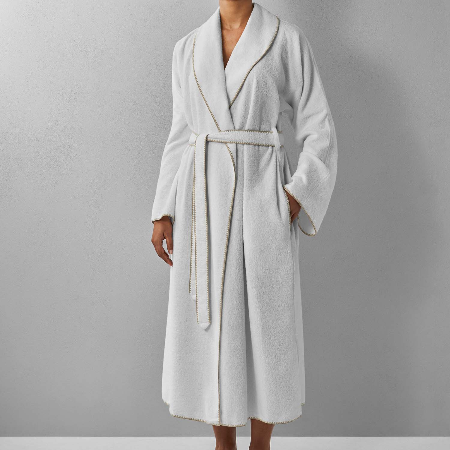 Bordado Shawl Sand Trim robe featuring a plush weave, moisture-absorbing design, and unique millennial grey accents.