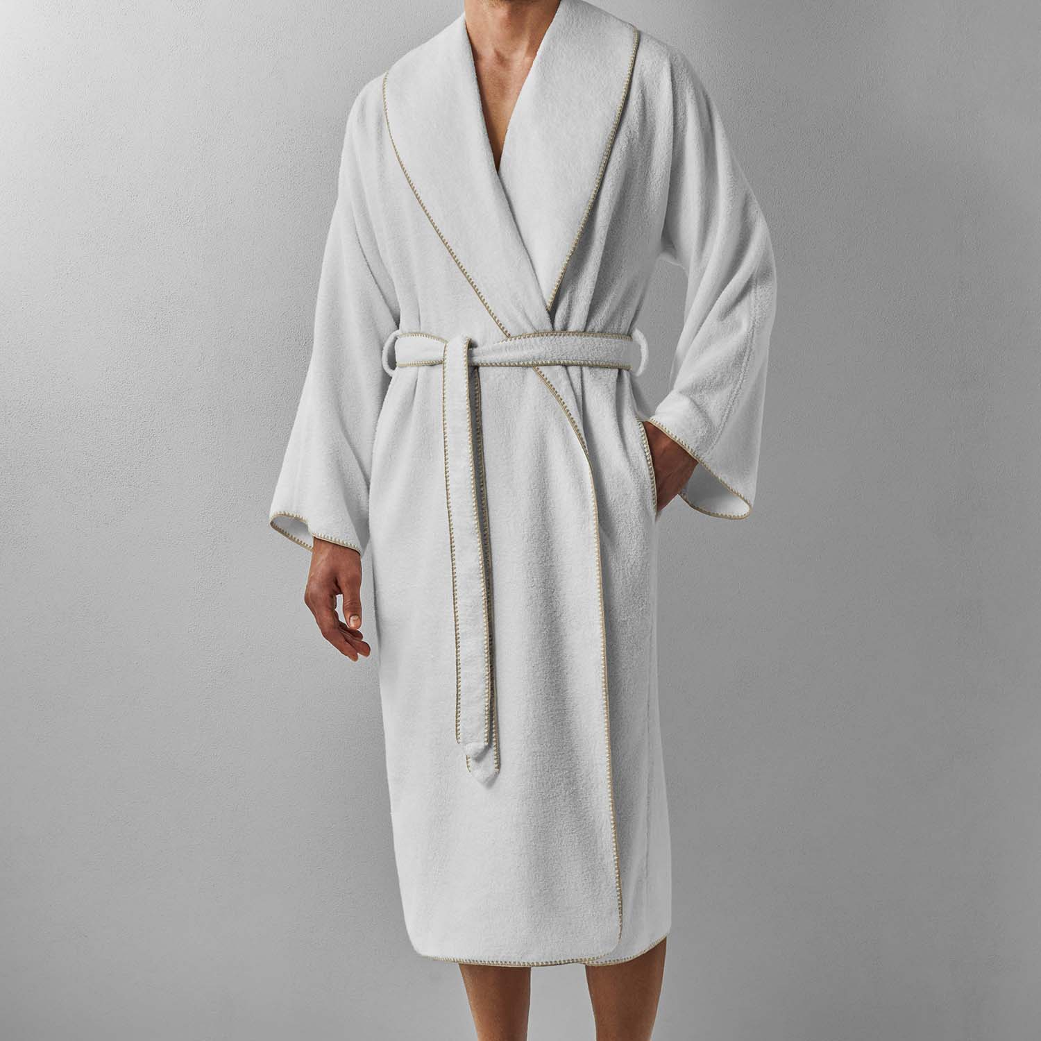 Bordado shawl with sand trim, featuring soft plush fabric, self-tie belt, and side pockets for ultimate comfort.