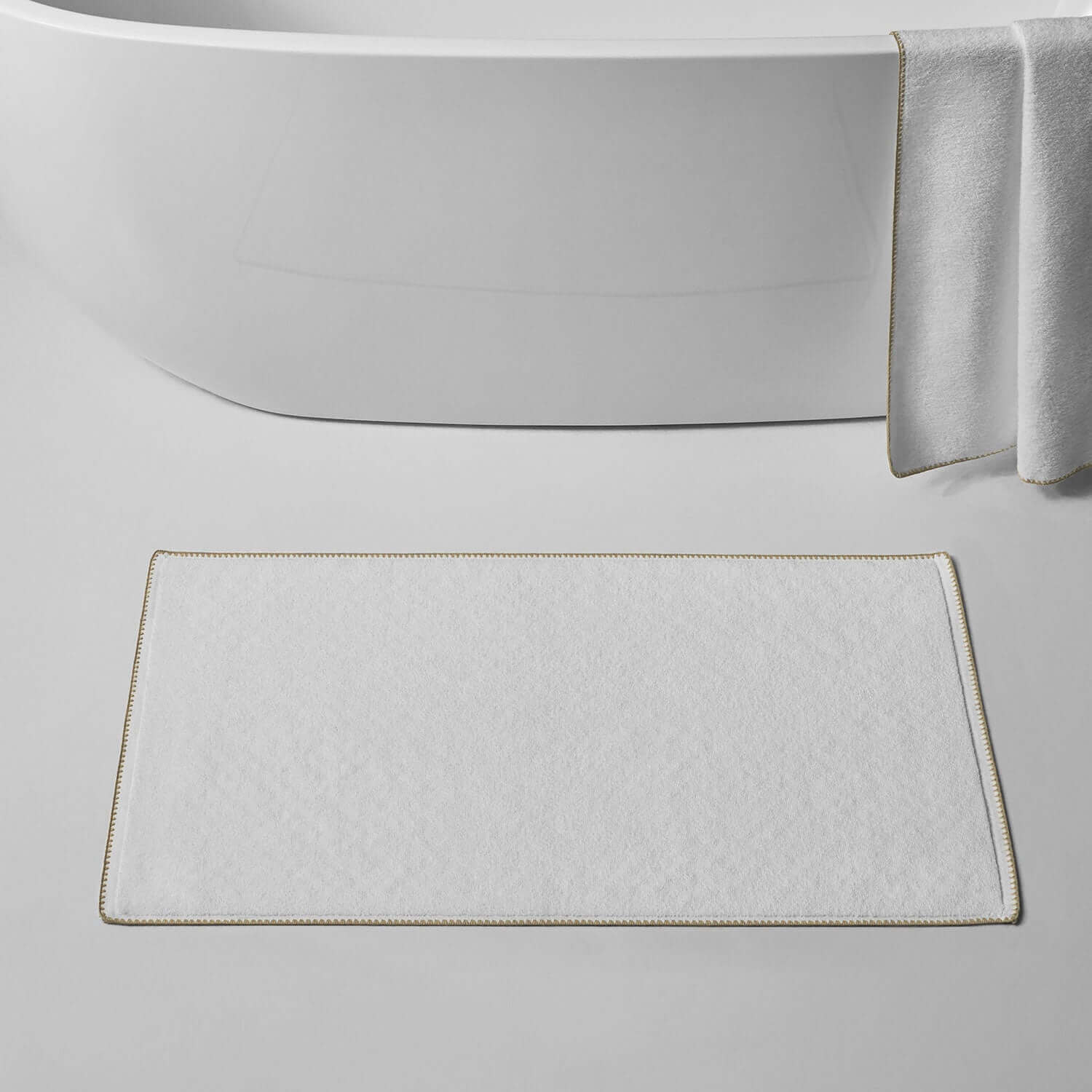 Bordado Mat Sand Trim with eco-pellet grip technology for bathroom use, featuring soft millennial grey cotton trim.
