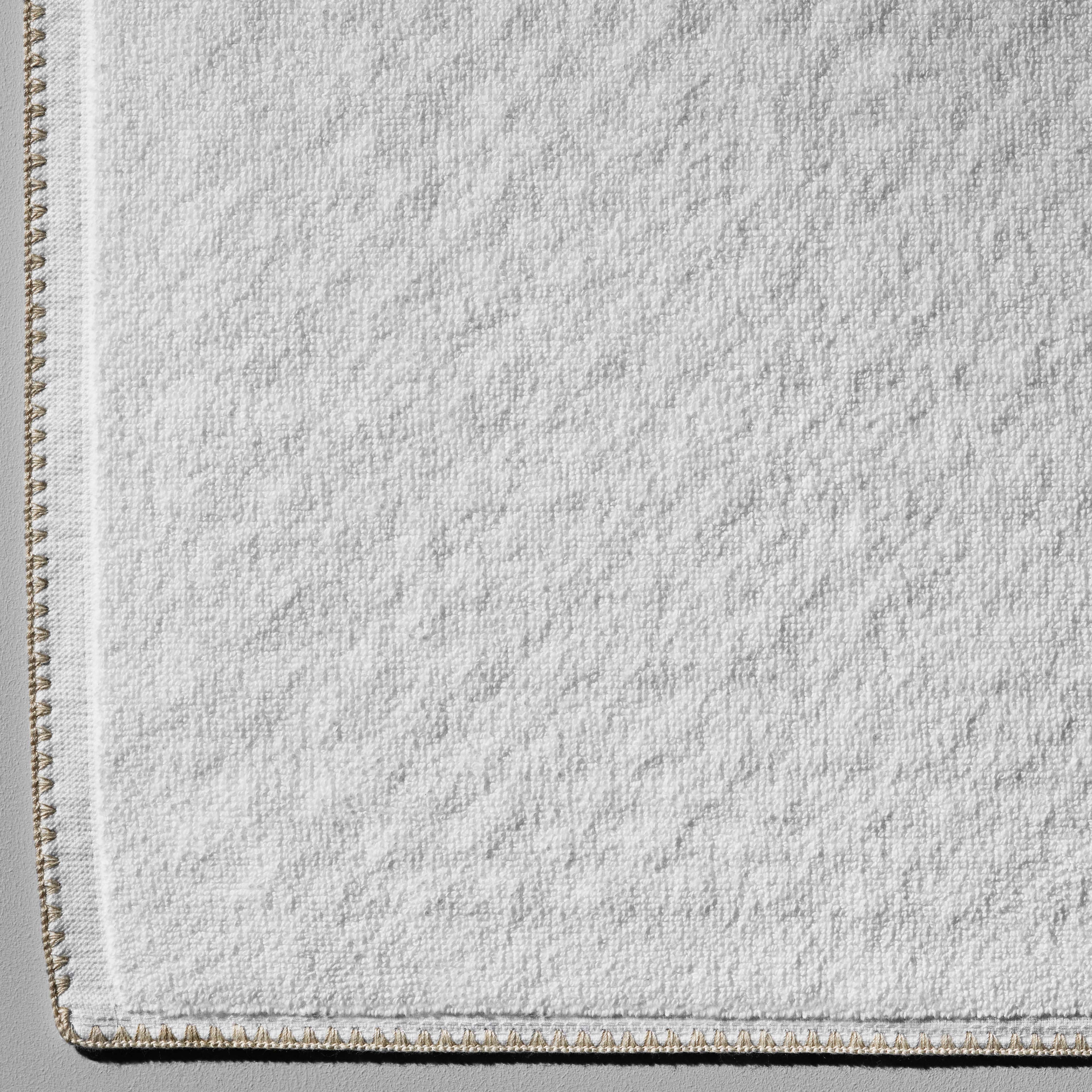 Bordado Bath Bundle towel featuring millennial-grey trim, ultra-absorbent, space-saving design in pure Brazilian cotton.