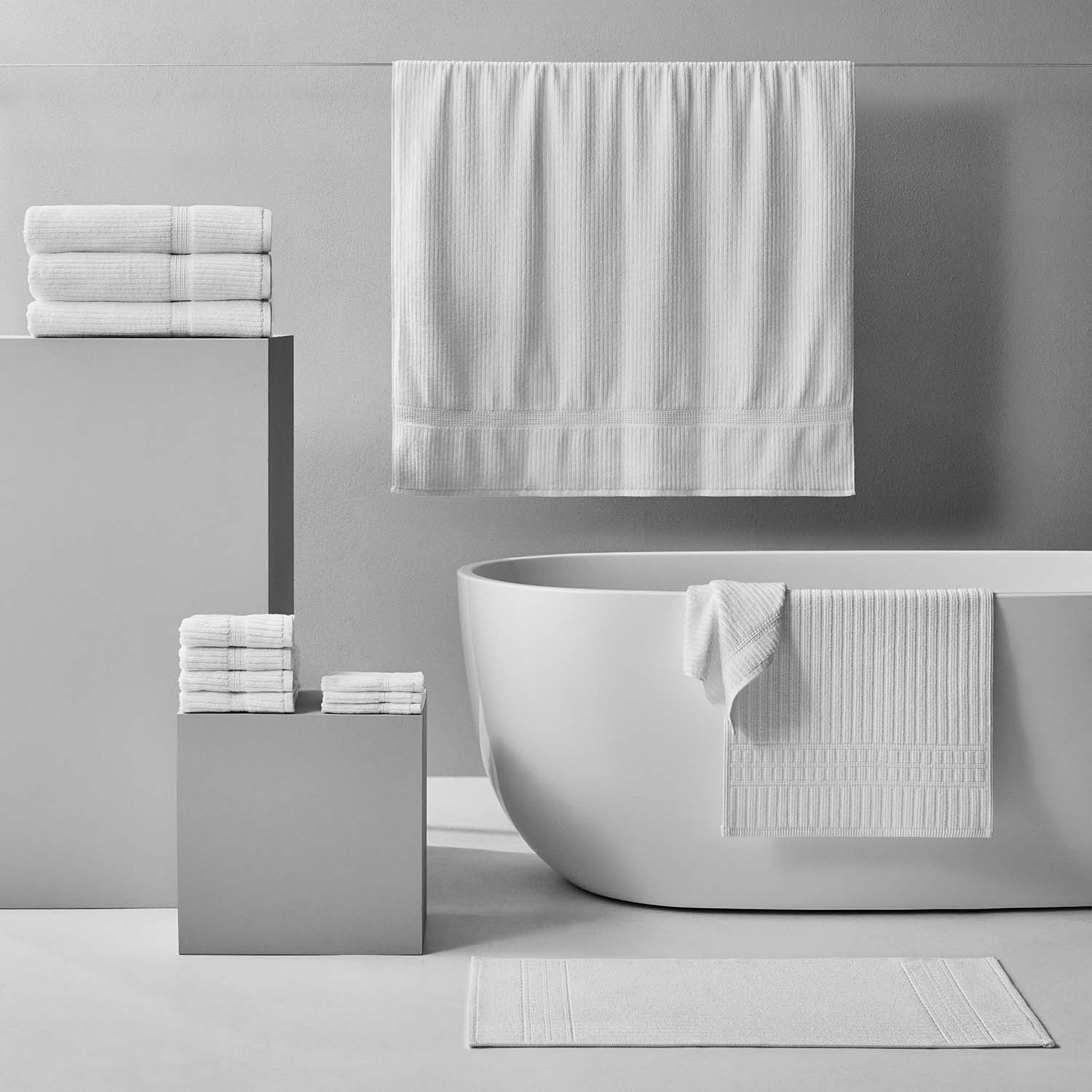 Canelado towel set displayed in a modern bathroom, perfect for daily spa rituals at home.