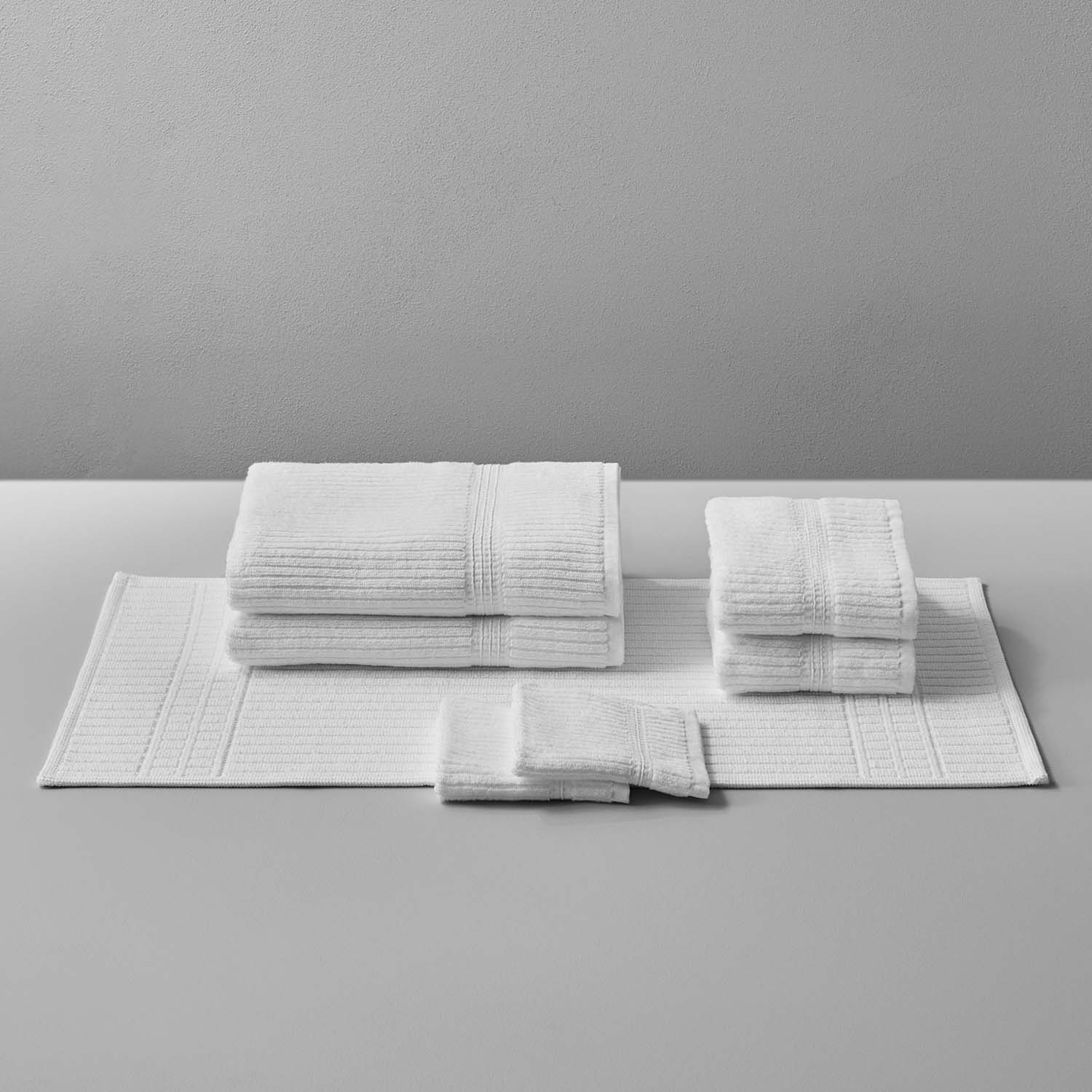 Canelado Towel set featuring luxurious white towels, perfect for enhancing your daily spa rituals at home.