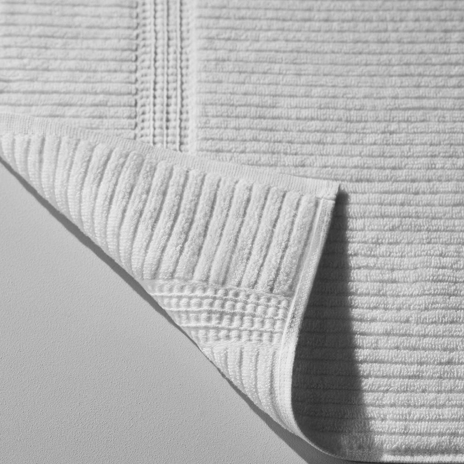 Close-up of a Canelado towel, showcasing its textured design, perfect for daily spa rituals at home.