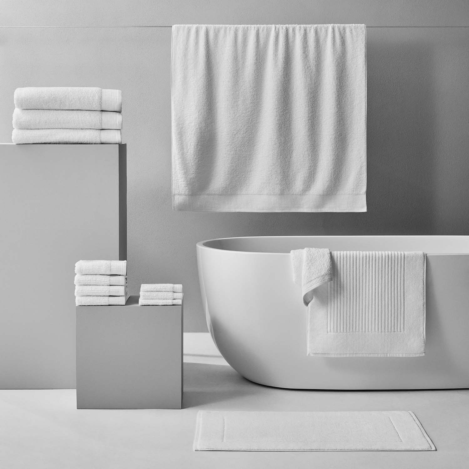 Luxor Towel set made from plush Egyptian Cotton™, displayed elegantly in a modern bathroom setting.