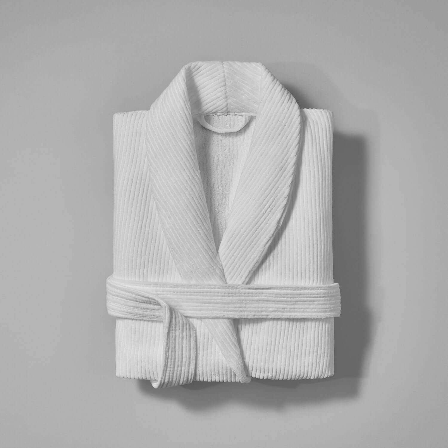 Luxor Shawl Wholesale robe folded, featuring retro collar and lightweight comfort for spa rituals.