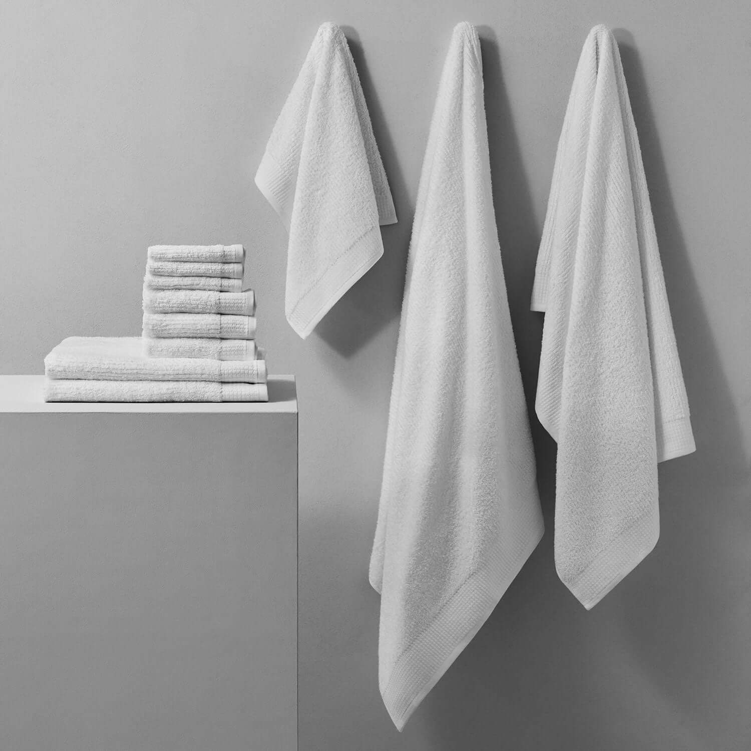 Luxor Towel set showcasing plush, authentic Egyptian Cotton™ towels hung and stacked elegantly.