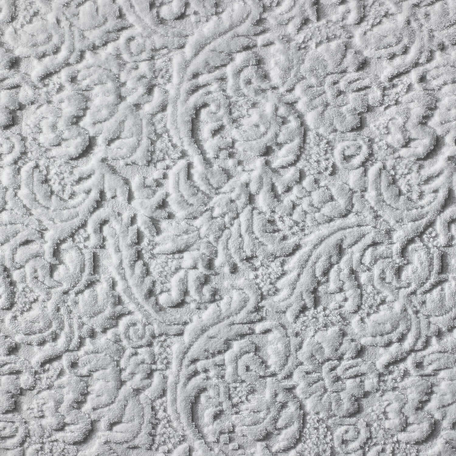 White Baroque blanket fabric showcasing a sensual velour pattern, ultra-soft texture, and intricate design.