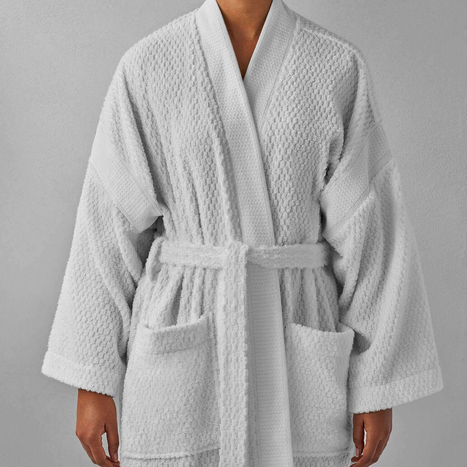 Novotel Jacquard Kimono robe in soft-touch biconcave pattern with braided neckline and oversized pockets.