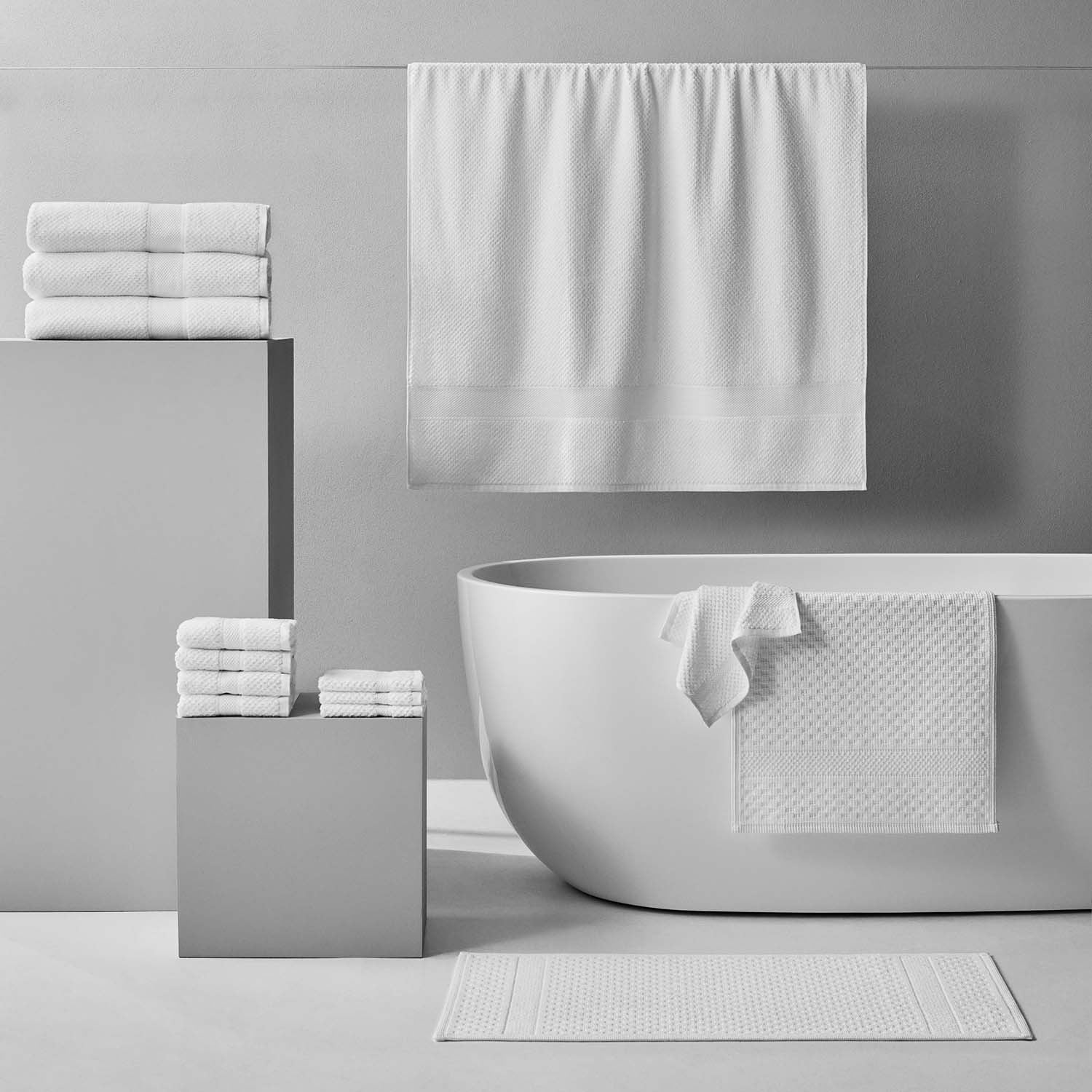 Novotel Towel collection featuring luxurious 100% Brazilian cotton towels in a modern bathroom setting.
