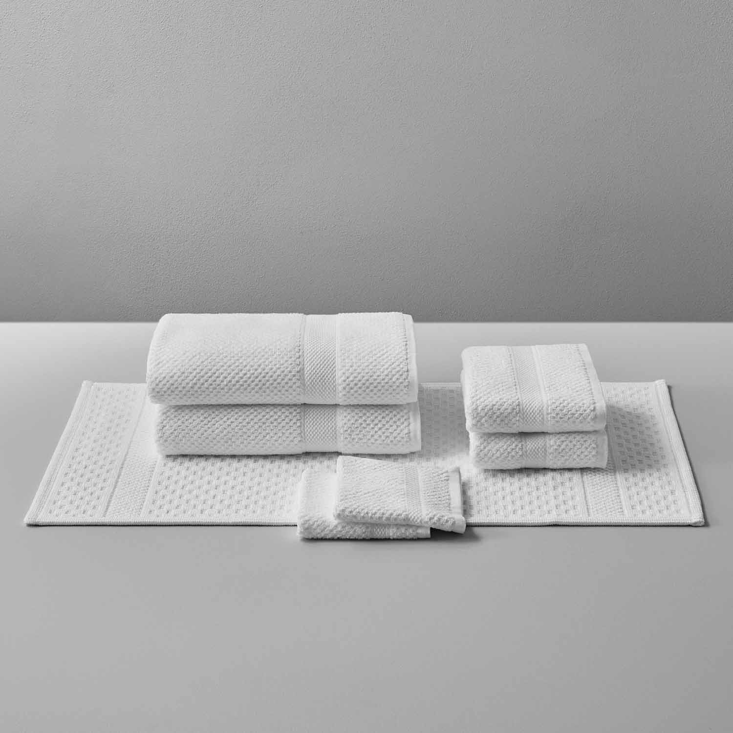 Elegant Novotel Towel set made from 100% long-fibre Brazilian cotton, perfect for luxury and performance in any setting.
