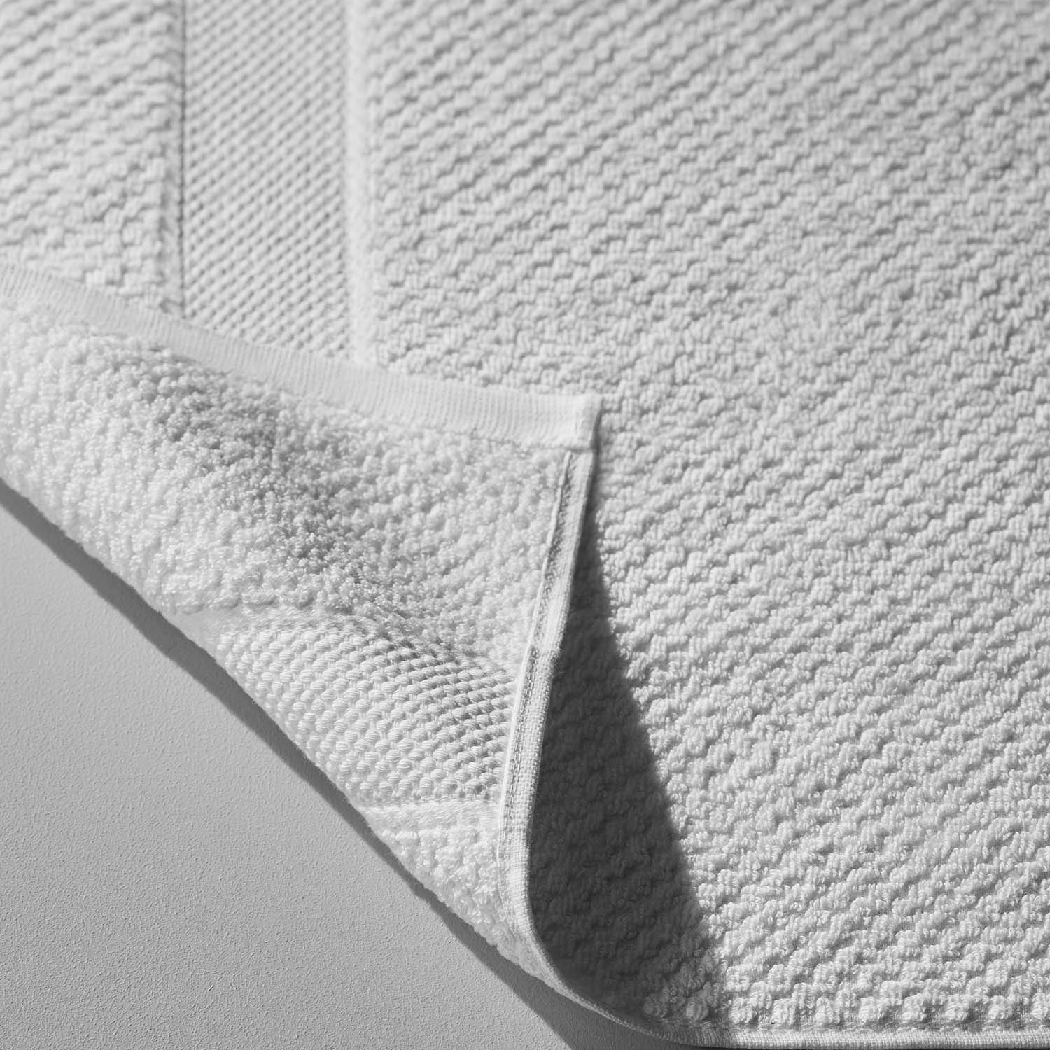 Close-up of a Novotel towel made from 100% long-fibre Brazilian cotton, showcasing its luxurious texture and quality.