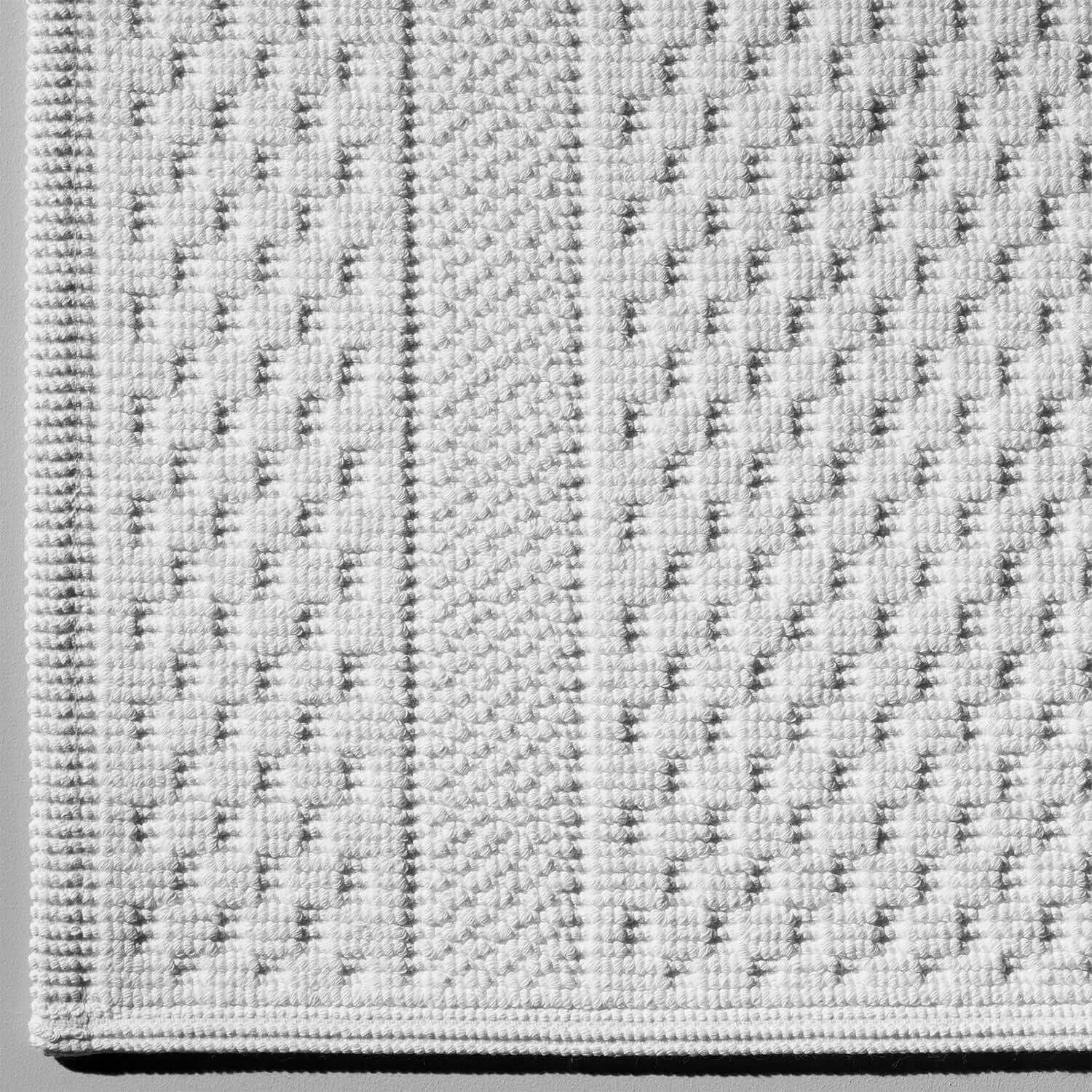 Highly textured Novotel Mat showcasing artisan craftsmanship, perfect for luxury hotels and spas.