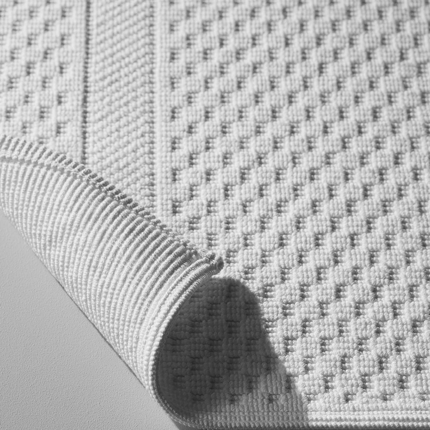 Close-up of the Novotel Mat, showcasing its textured design, ideal for luxury hotels and spas.