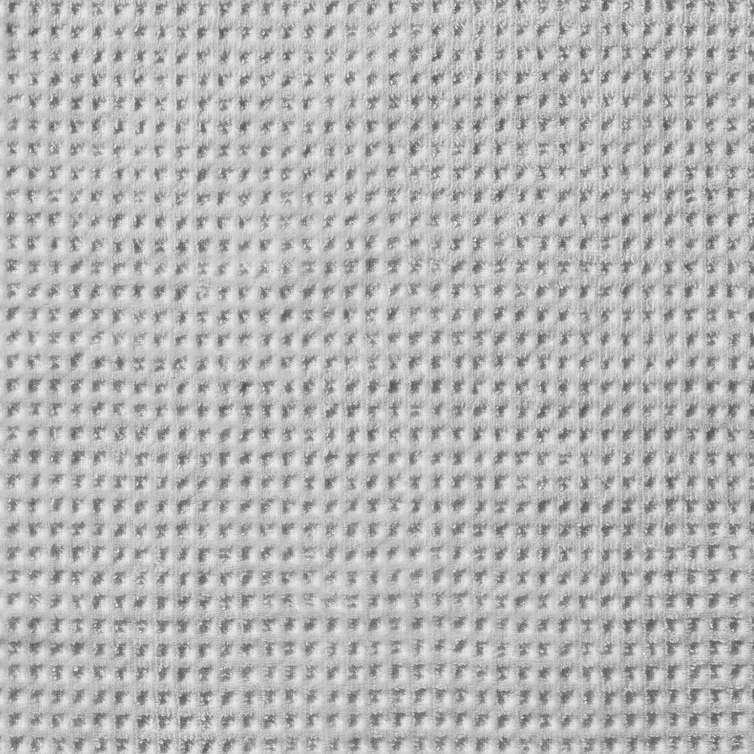Close-up of a textured gray fabric, showcasing its soft and durable weave, ideal for high-quality linens.