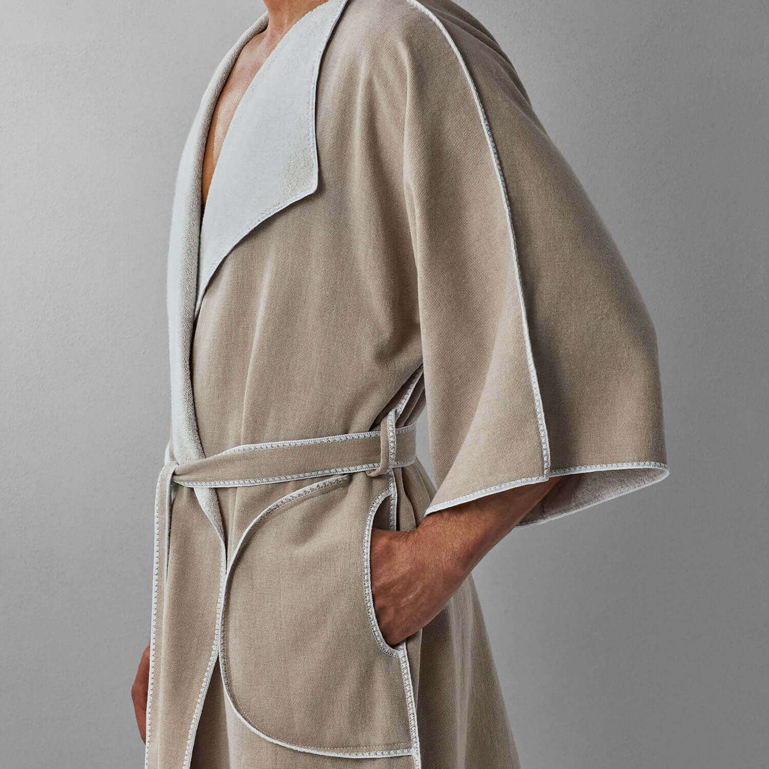 Stylish SOL Robe Sand in eco-friendly cotton, featuring a chic cardigan lapel and comfortable ¾ sleeves.