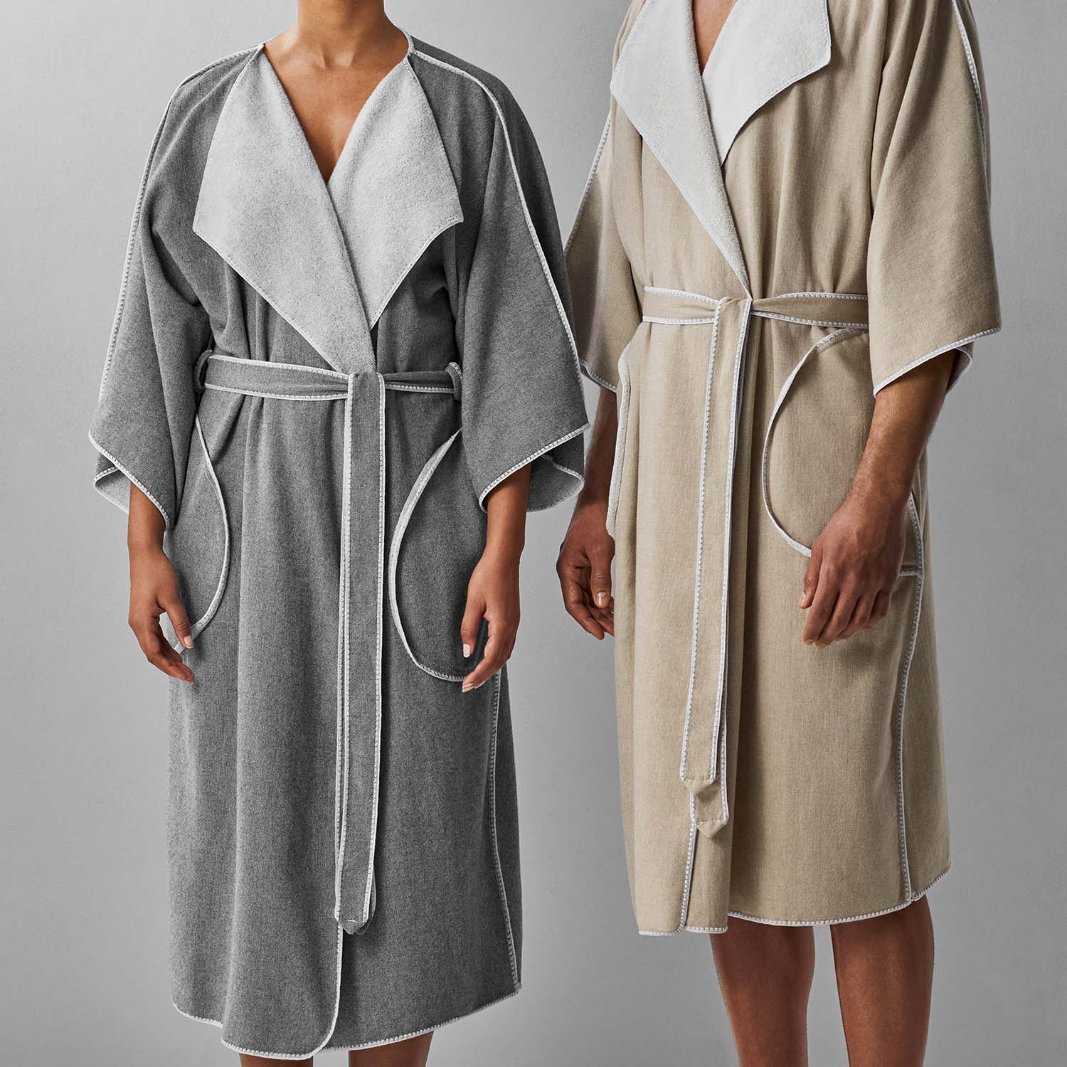 Two models wearing SOL Robe in gray and beige, showcasing eco-friendly design and stylish comfort.