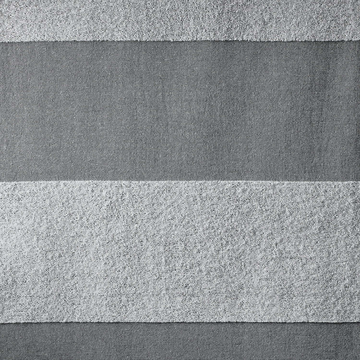 SOL Striped Towel Gray close-up, showcasing eco-friendly fabric ideal for beach, pool, and sports use.