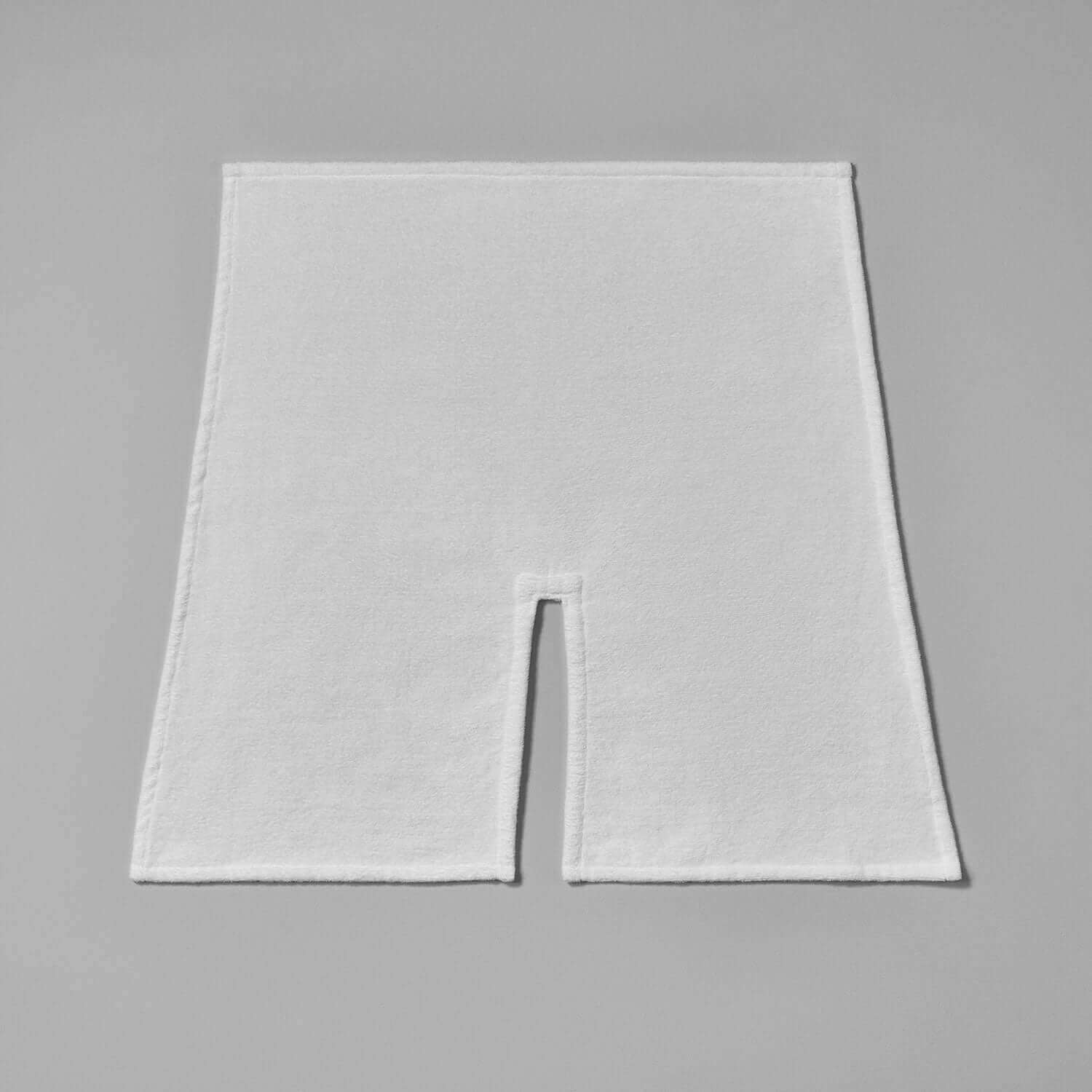 Massage cradle cover made of soft cotton terry velour, providing ultimate comfort for facial treatments.