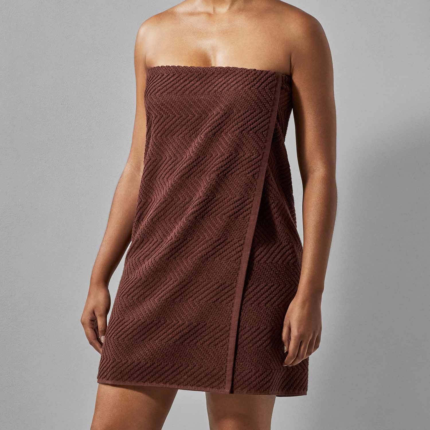 Bruno wholesale treatment towel in rich brown, ideal for spas and enhancing bath, shower, or pool experiences.