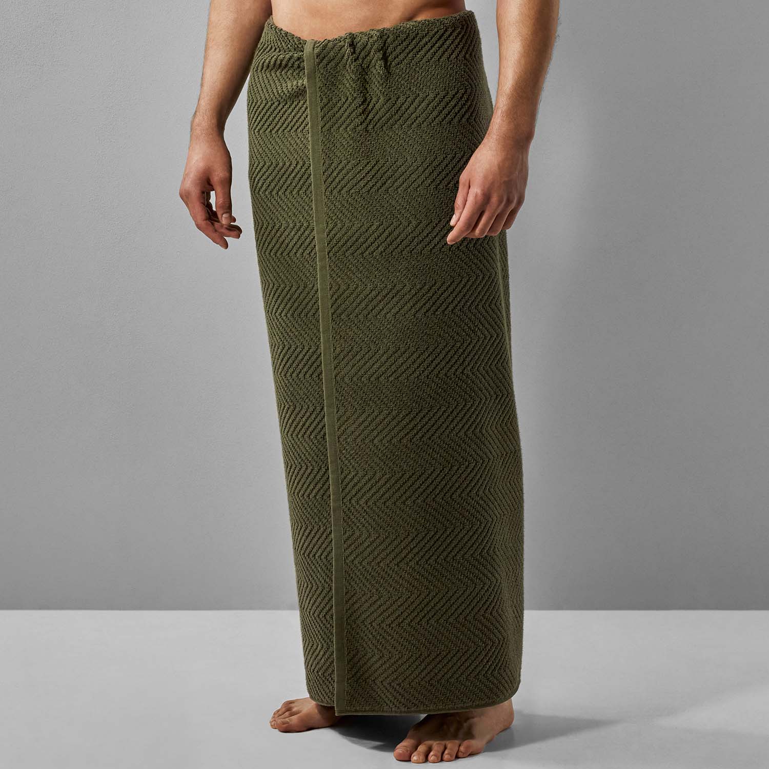 Olive green treatment towel designed for spa use, embodying the essence of nature for bath, shower, or pool settings.
