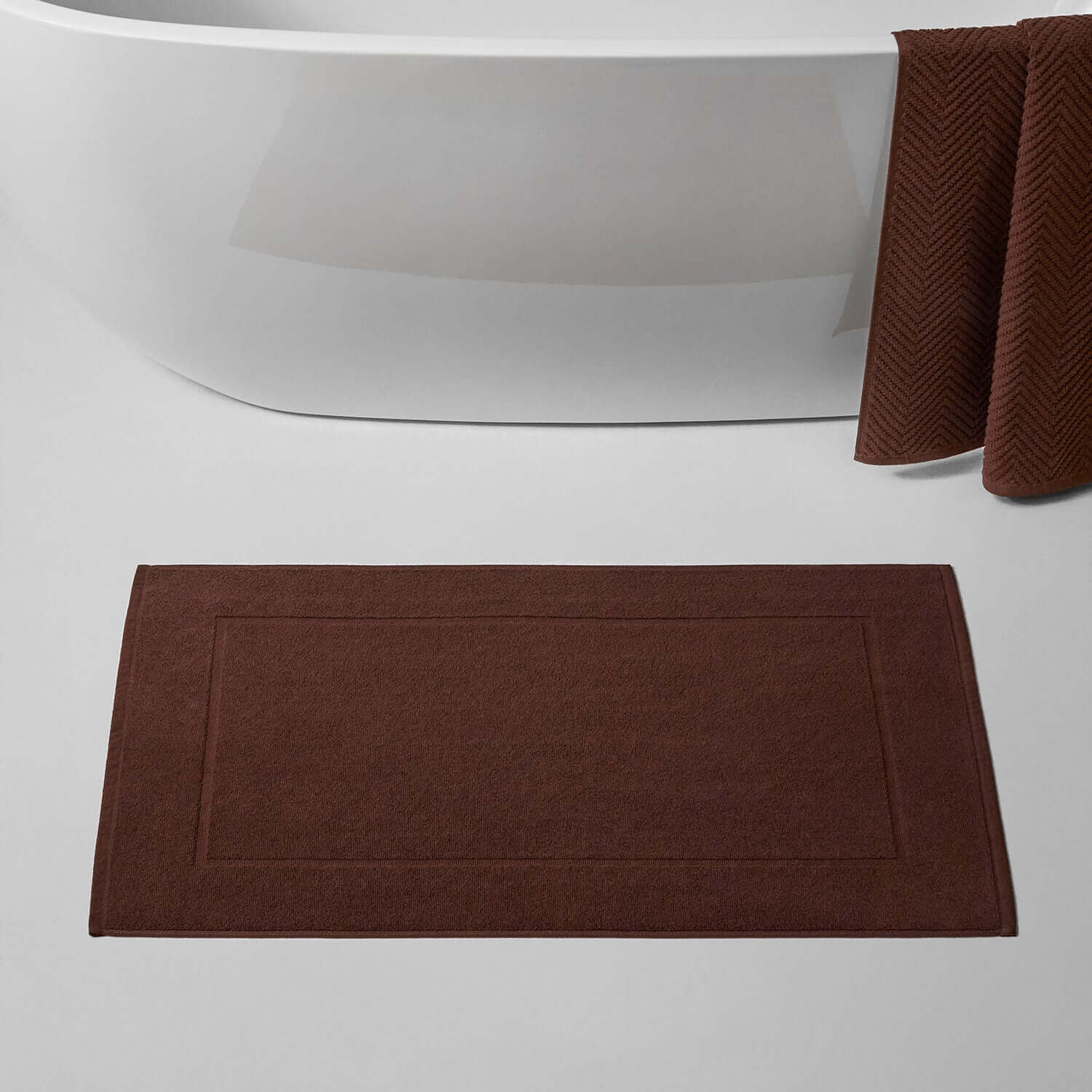 Bruno Treatment Mat in deep brown color, designed for clay and mud treatments, complements modern spa interiors.