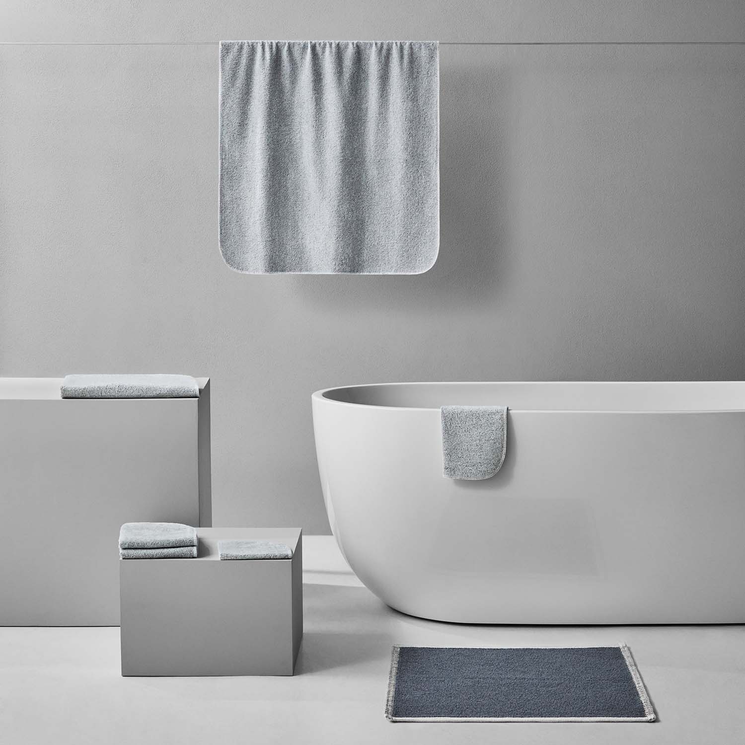 Tuxedo Bath Bundle in gray featuring eco-luxury towels and mat for a modern, sustainable bathroom.