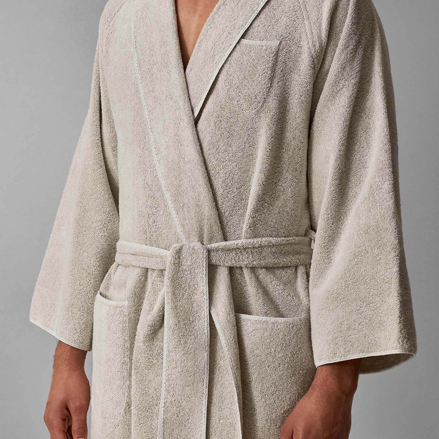 Elegant unisex tuxedo shawl sand robe in soft grey, featuring a self-tie belt and round hems, perfect for luxury settings.