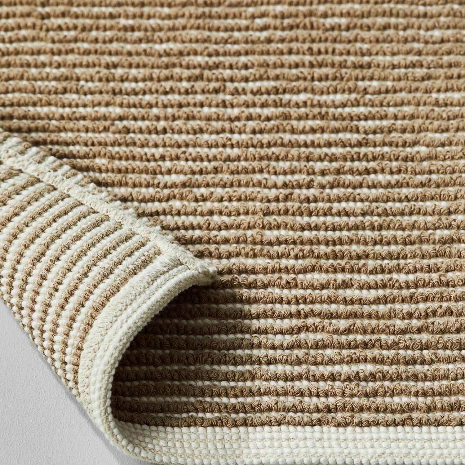 Tuxedo Mat Sand featuring grey stripe pattern, modern square shape perfect for sinks or showers.