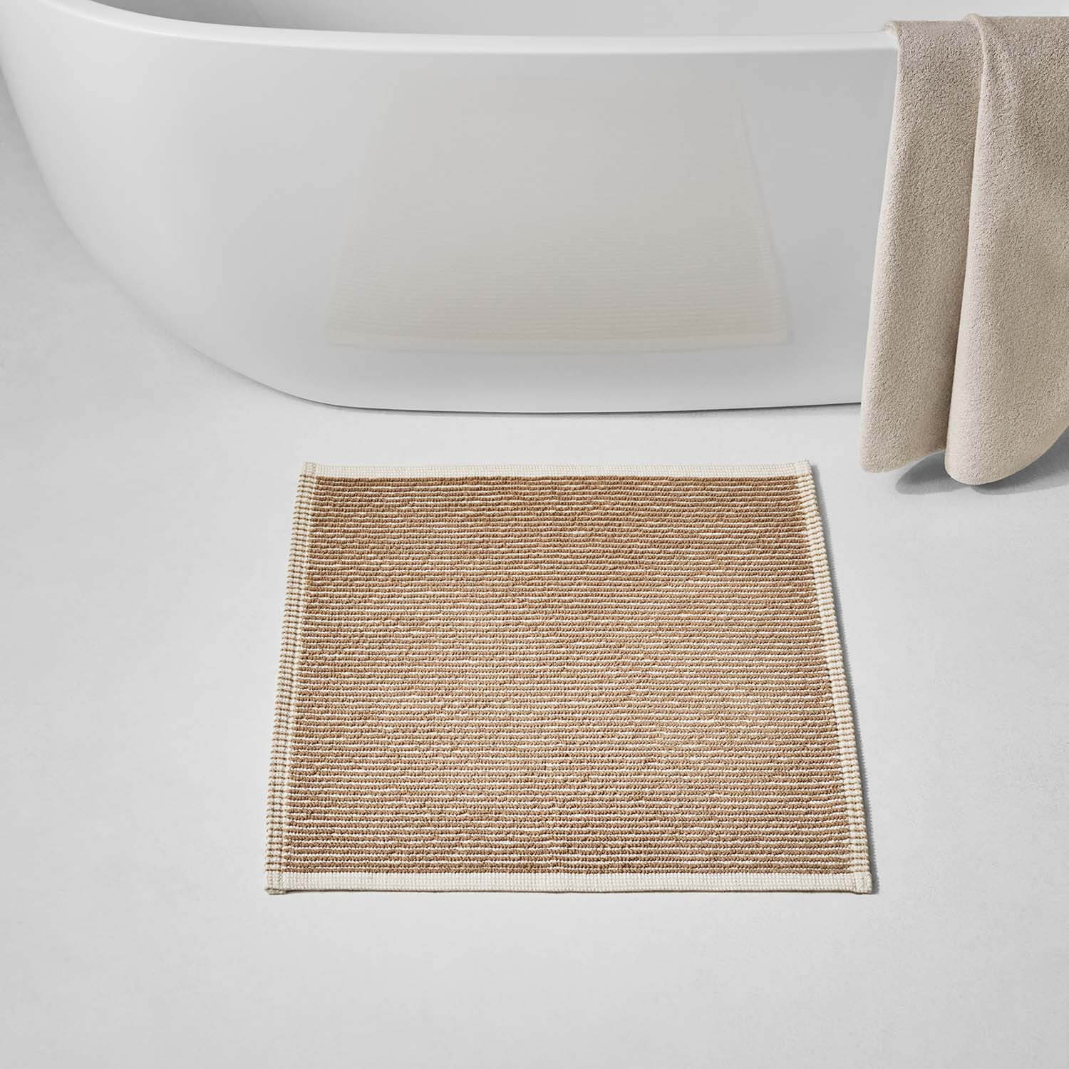 Tuxedo Mat Sand with grey stripe pattern, modern square design, perfect for sink or shower areas.