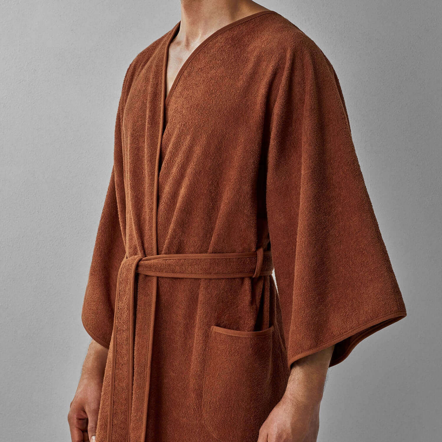 Wabi Sabi Copper Robe, embodying minimalist design and sustainable luxury, featuring a soft texture and timeless craftsmanship.