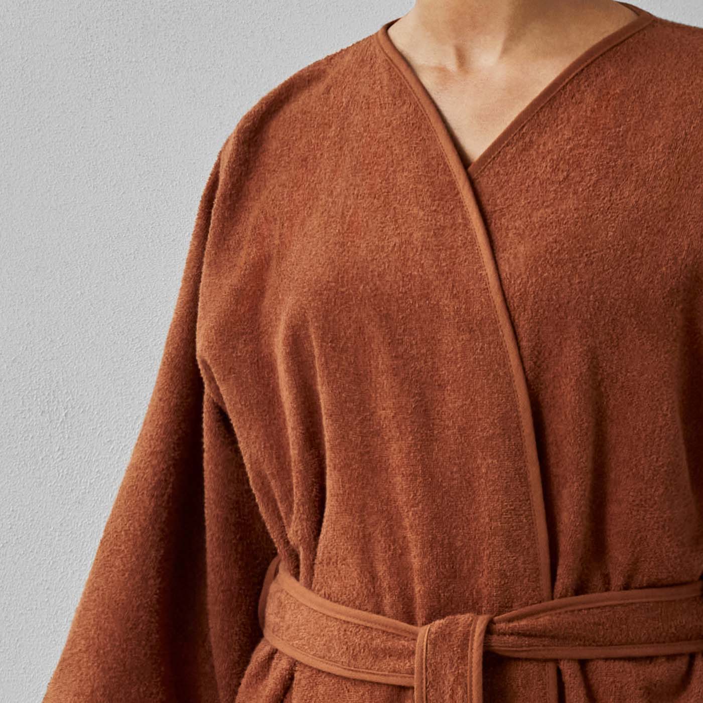 Wabi Sabi Copper Robe showcasing luxury, minimalist design, and timeless craftsmanship in a sustainable fabric.