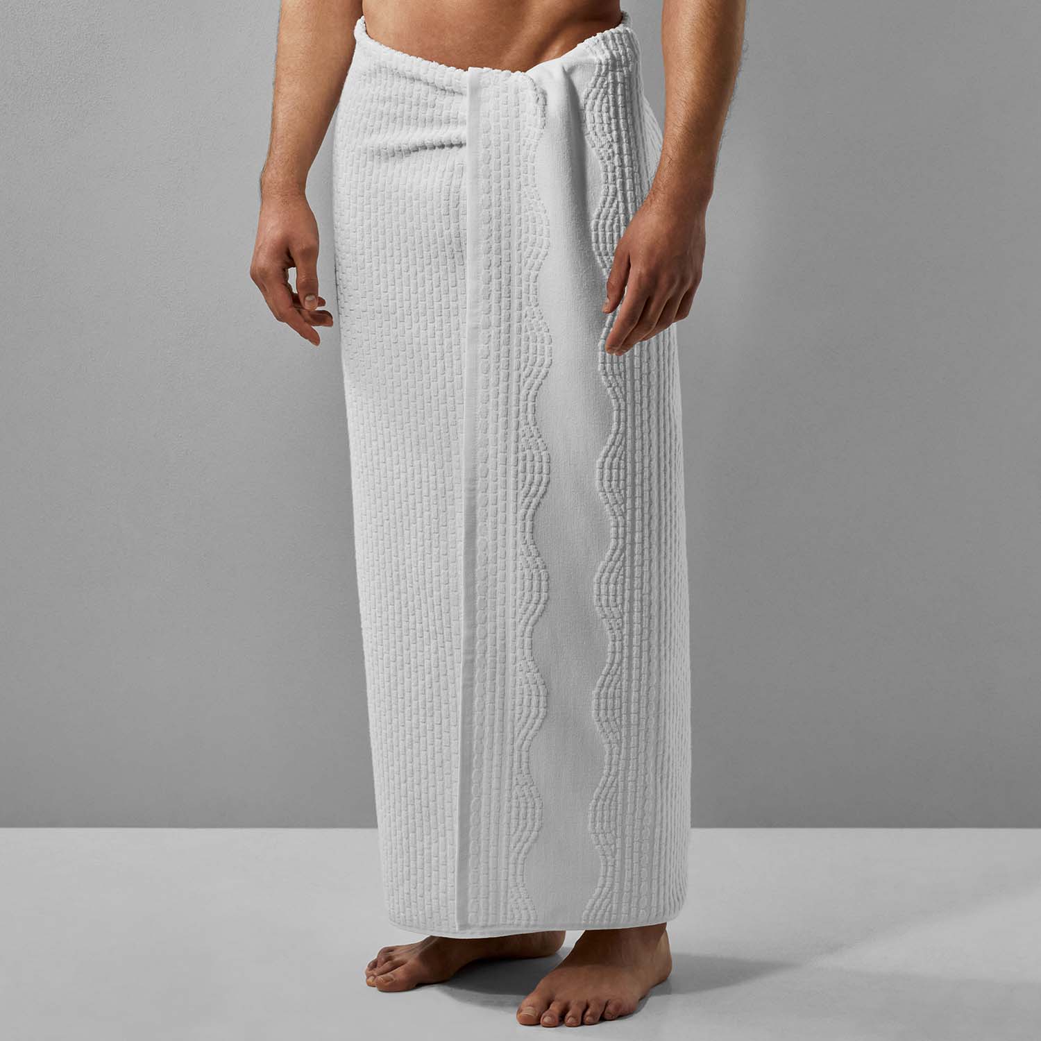 Lightweight pure cotton wave towel wrap, perfect for beach or pool; ideal for quick drying after aquatic activities.