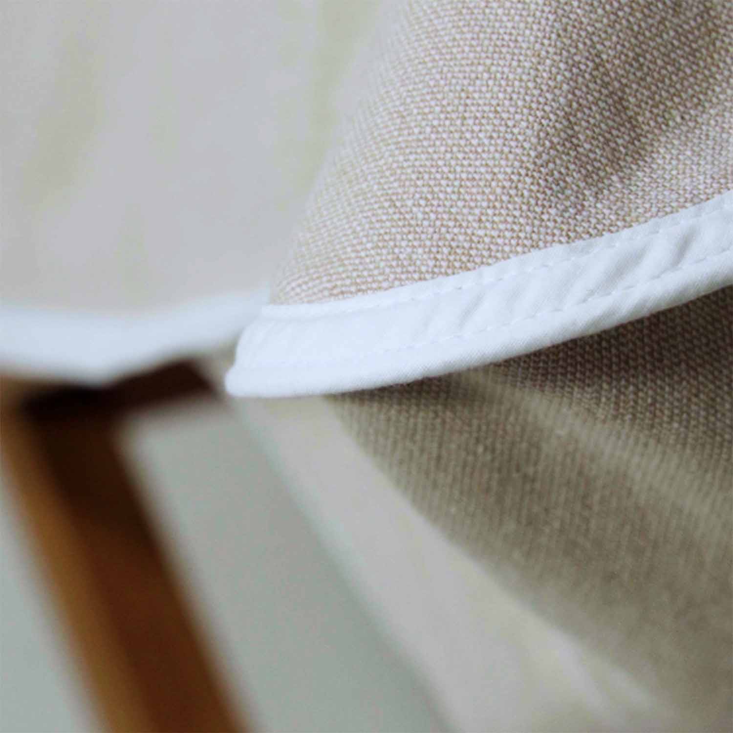Close-up of the SOL Lounge Chair Cover in sand color showcasing secure-fit and quality fabric texture.