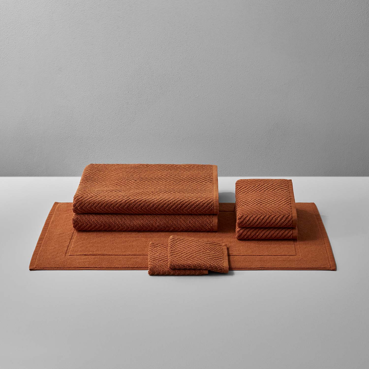 Cozy Treatment Bath Bundle Clay in warm earthen tones, featuring soft textured towels for relaxation and durability.