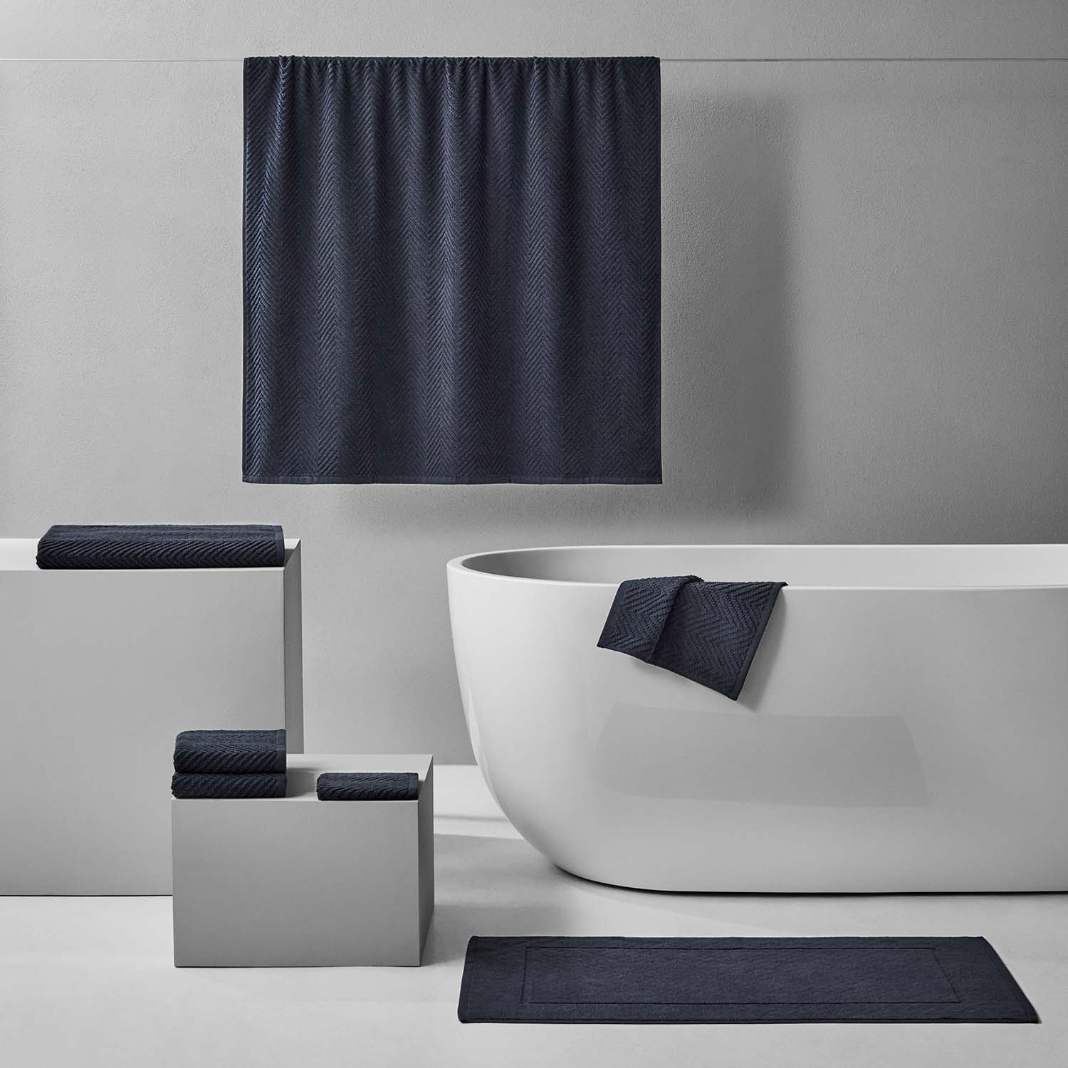Treatment Bath Bundle Slate featuring dark tones and soft textures for a stylish and relaxing bathroom experience.