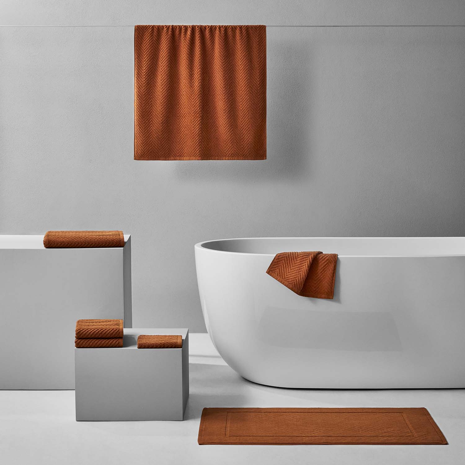 Treatment Bath Bundle Clay featuring warm earthen tones and soft textures in a modern bathroom setting.